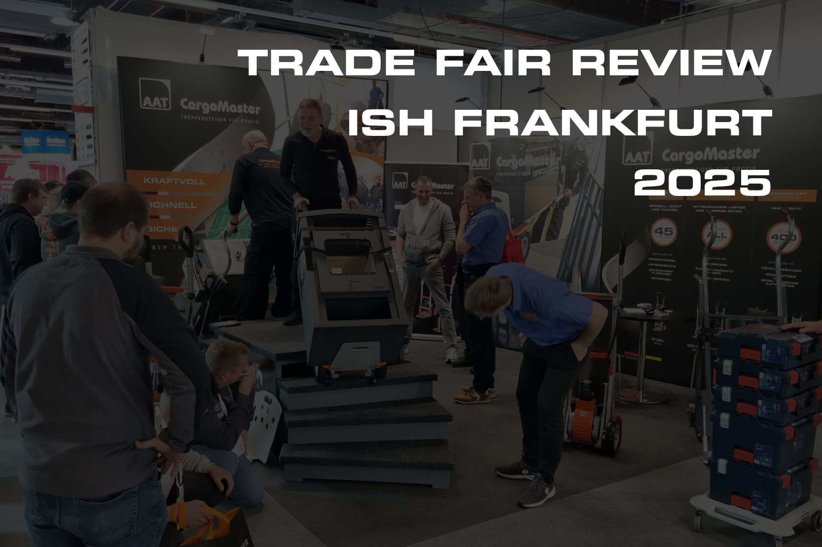 The picture shows the AAT CargoMaster stand at the ISH trade fair in Frankfurt 2025. In the foreground is "Trade fair review ISH Frankfurt 2025"